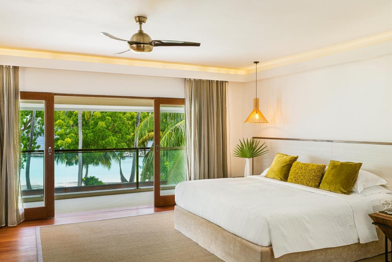 Kurumba Maldives Vihamanaafushi Buitenkant foto A bedroom at the resort