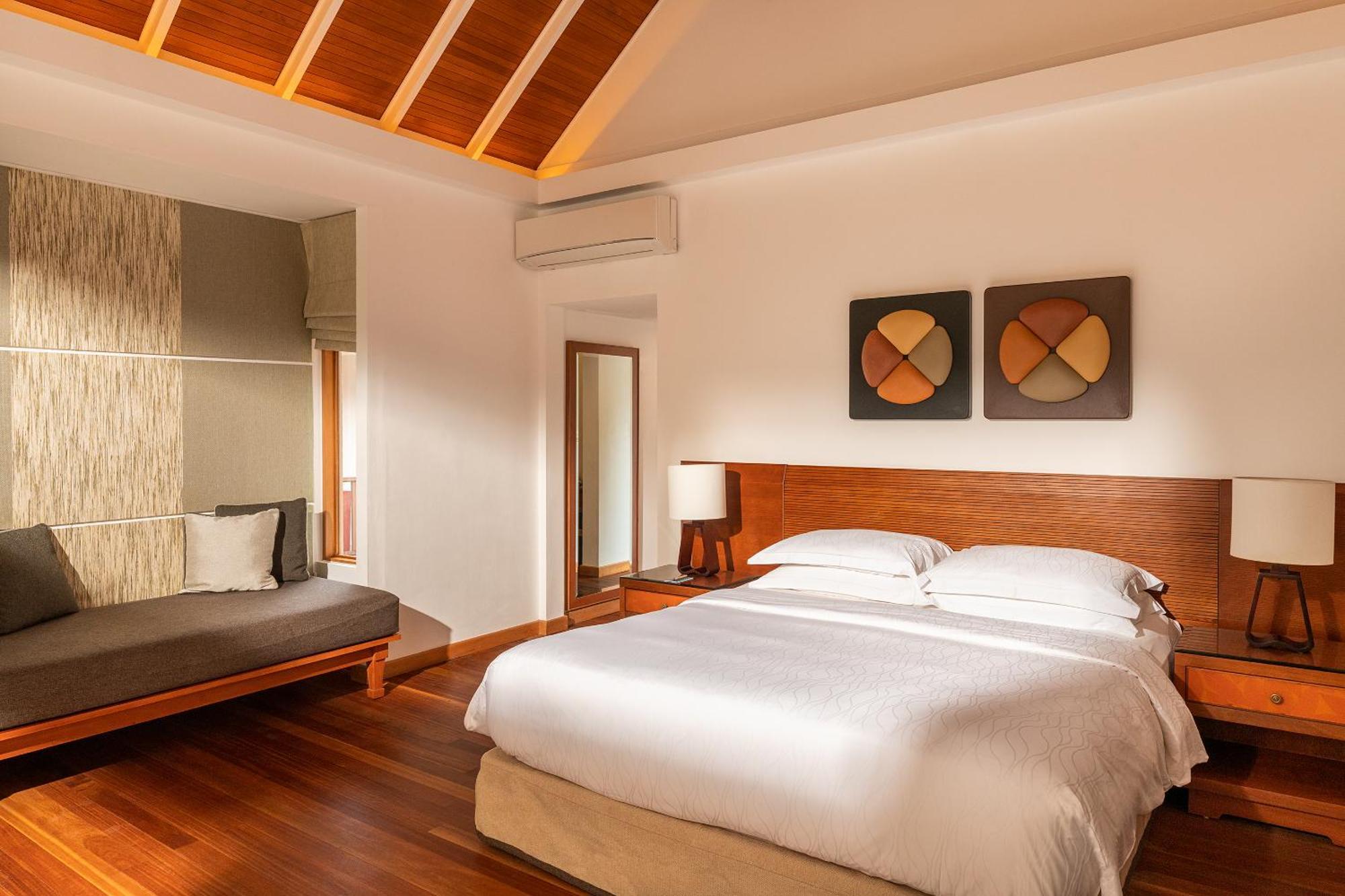 Kurumba Maldives Vihamanaafushi Buitenkant foto A bedroom at the resort