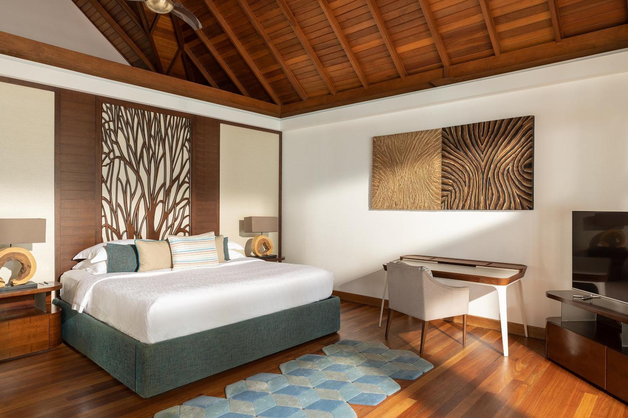 Kurumba Maldives Vihamanaafushi Buitenkant foto A bedroom at the resort