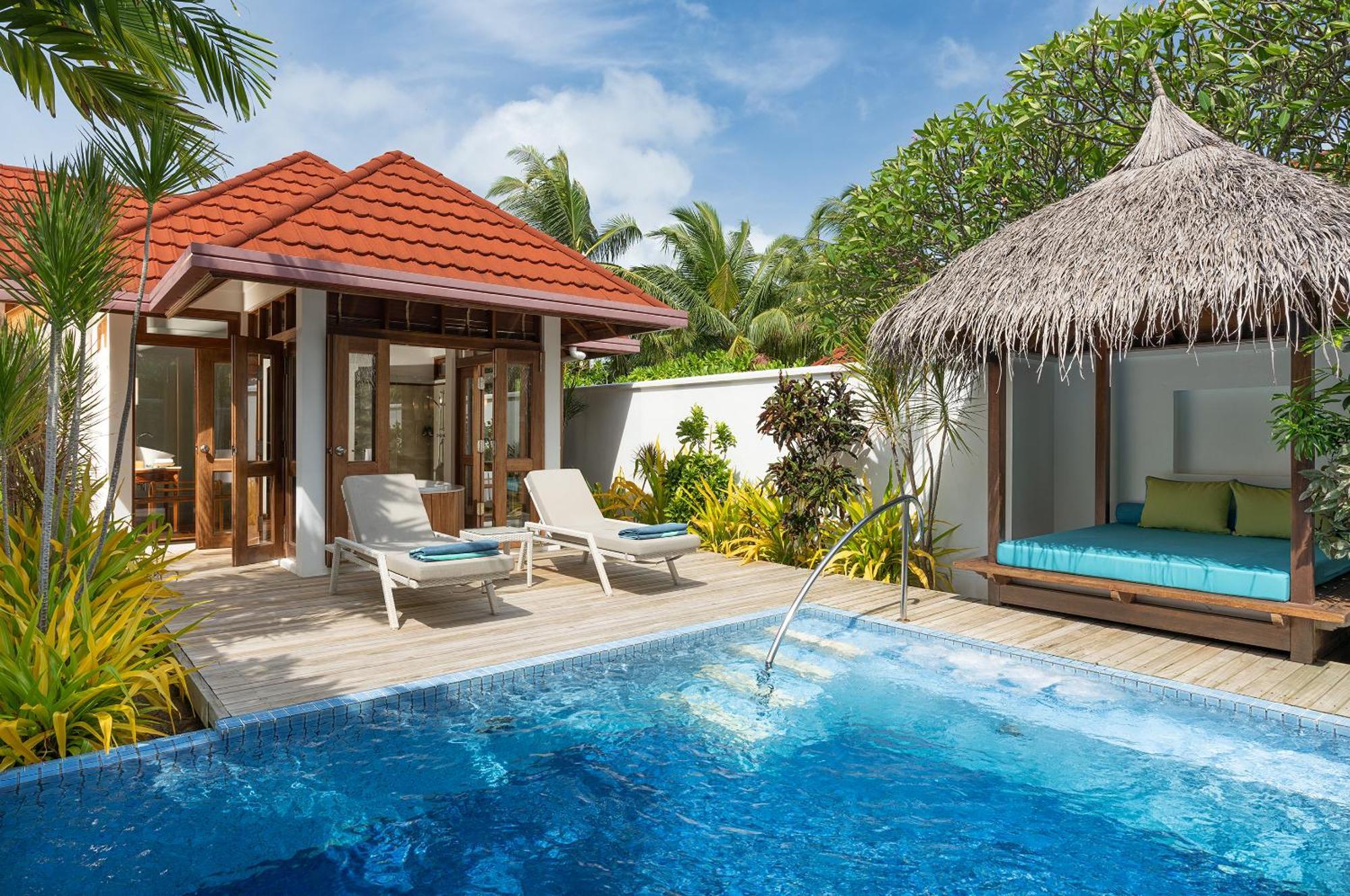 Kurumba Maldives Vihamanaafushi Buitenkant foto A pool villa at the resort