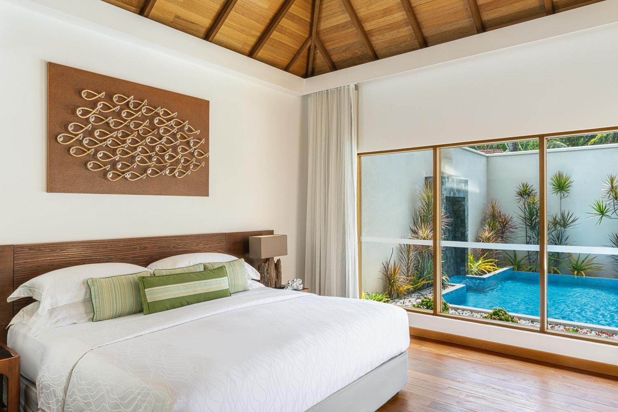 Kurumba Maldives Vihamanaafushi Buitenkant foto A bedroom at the hotel