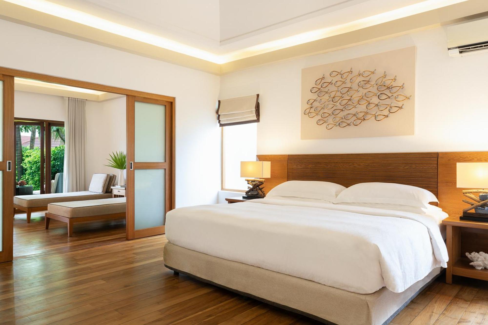 Kurumba Maldives Vihamanaafushi Buitenkant foto A bedroom at the resort
