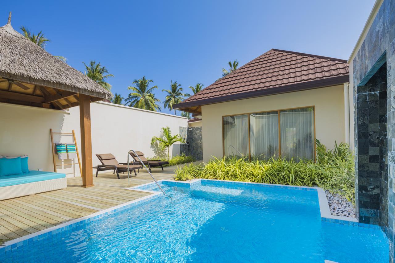 Kurumba Maldives Vihamanaafushi Buitenkant foto A pool villa at the resort